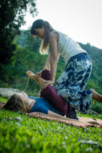 Vancouver Thai massage practitioner constance performing leg stretch on a person.