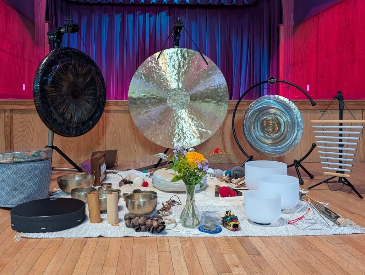 Gongs and singing bowls at a sound bath event
